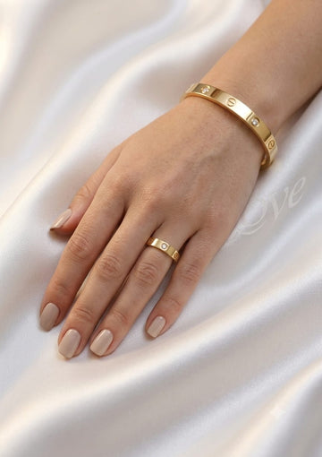 Iconic Screw Motif Ring & Luxe Hand Cuff